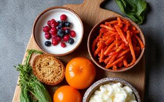 A vibrant plate of fermented foods like kimchi, yogurt, and kombucha.